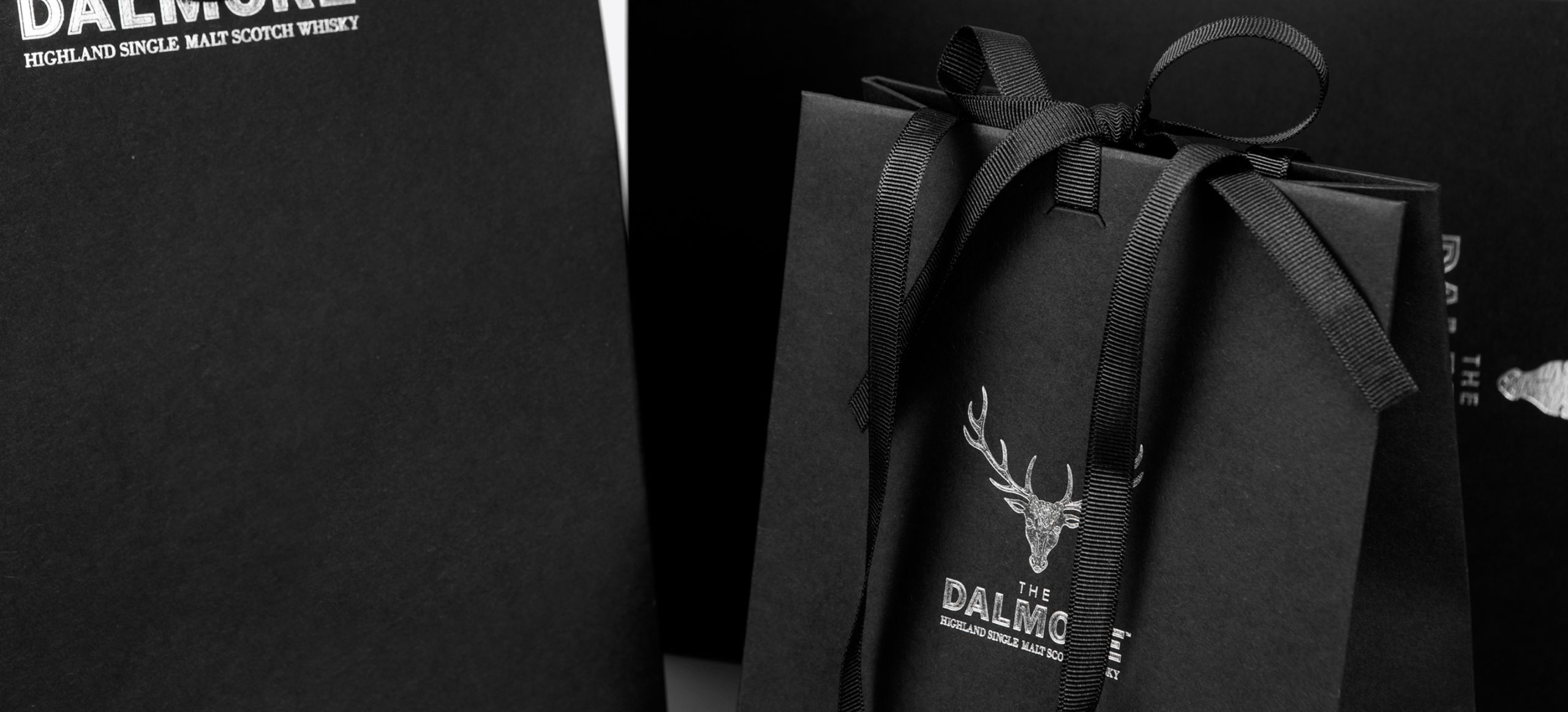 the Dalmore bottle bags with ribbon handles