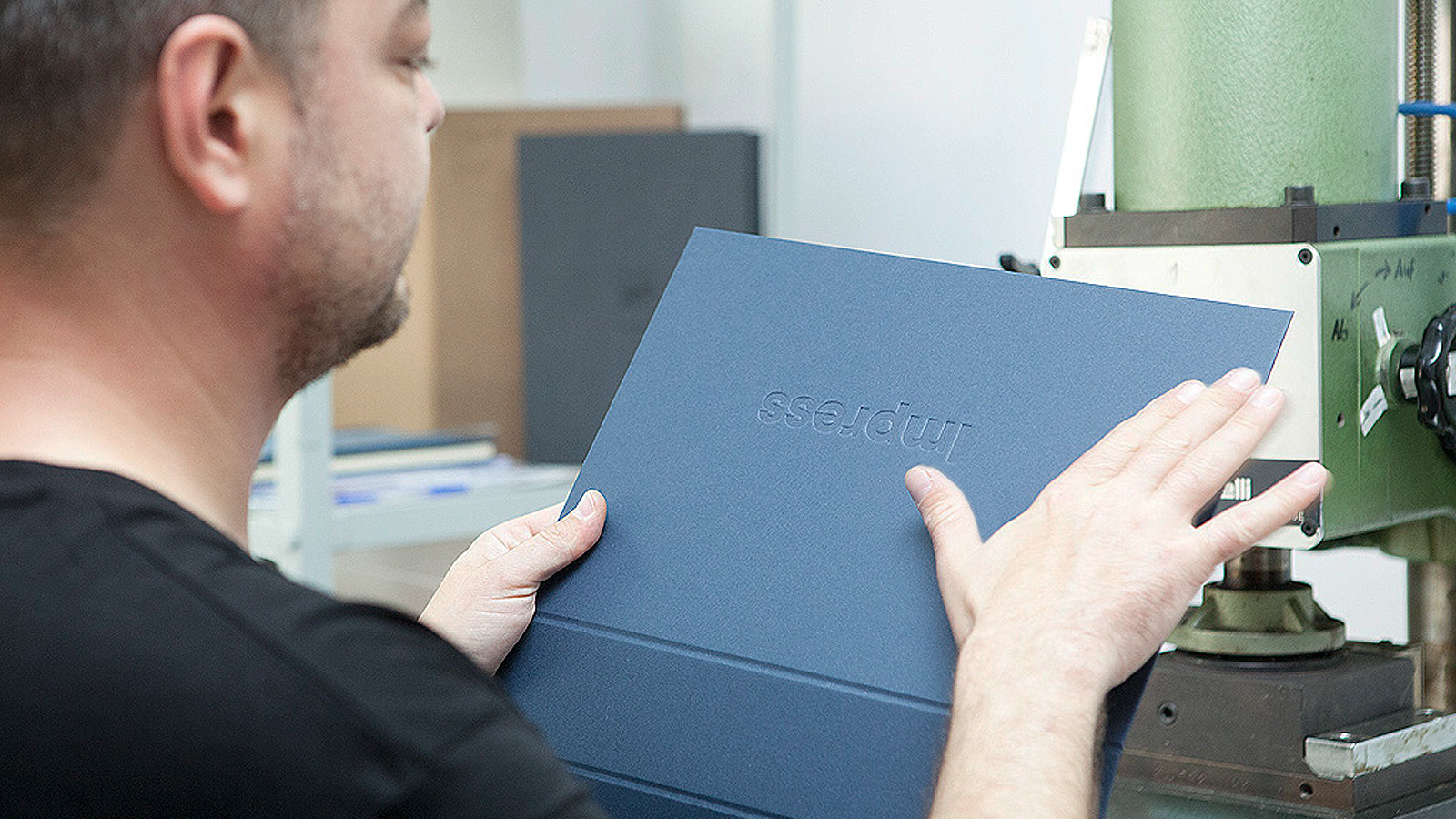 luxury-box-manufacturing-debossed-logo-on-greyboard-cover